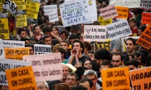 A protester shouts slogans during a demonstration in Madrid